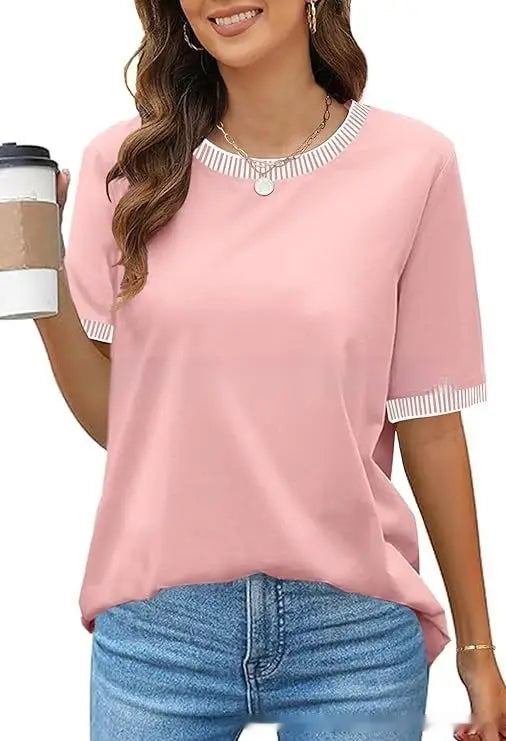 Women’s pink short sleeve knit top with white striped ruffle trim at neckline and cuffs
