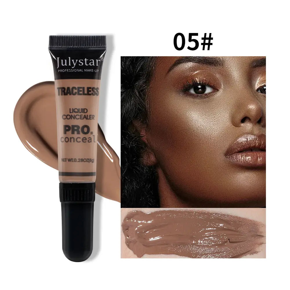 Julystar traceless pro tattoo concealer liquid makeup in shade 05# features a sleek black matte tube containing a creamy beige liquid formula.