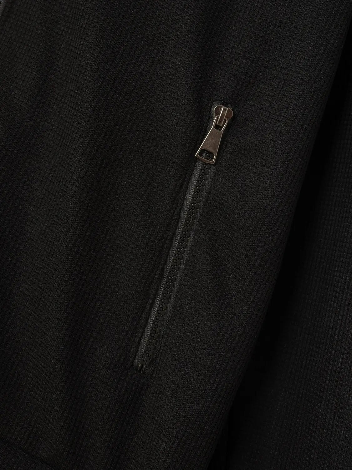 men waffle knit zip cardigan jacket in black textured fabric with silver zipper pull and matching teeth