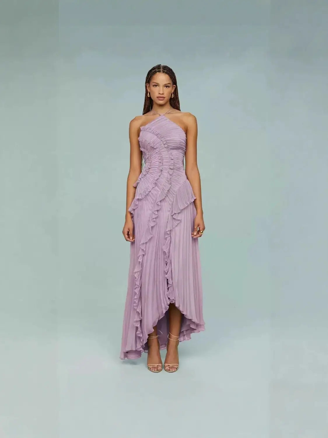 A lavender asymmetrical ruffled chiffon halterneck maxi dress with a high-low hemline suitable for evening wear.