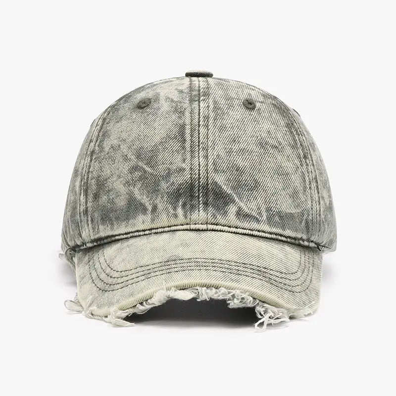 A distressed gray denim baseball cap with a frayed brim and faded worn-in texture.