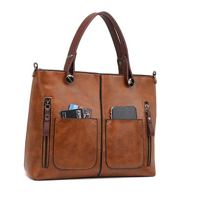 Brown leather retro large capacity tote crossbody bag featuring two front zippered pockets and sturdy handles.