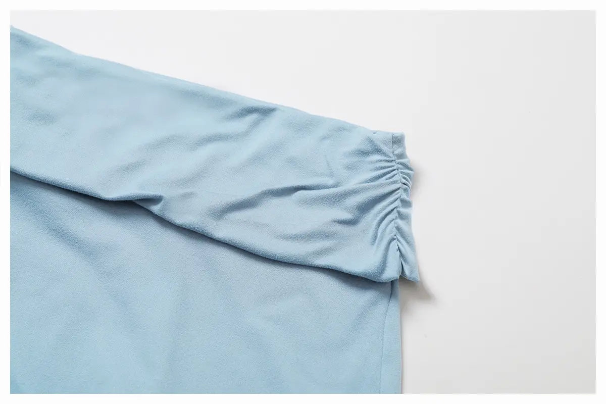 manga de tejido suave color azul claro con puño fruncido en pantalones de yoga acampanados de cintura alta