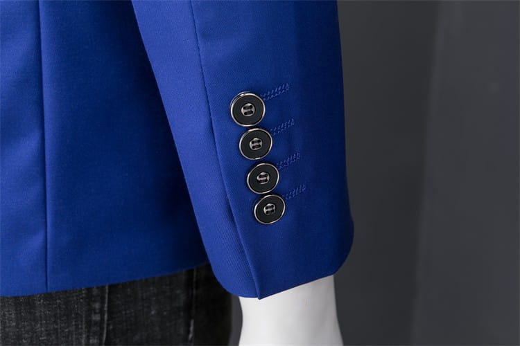 Chaqueta de vestir empresarial de pana azul real con ajuste slim, manga que presenta cuatro botones negros elegantes.