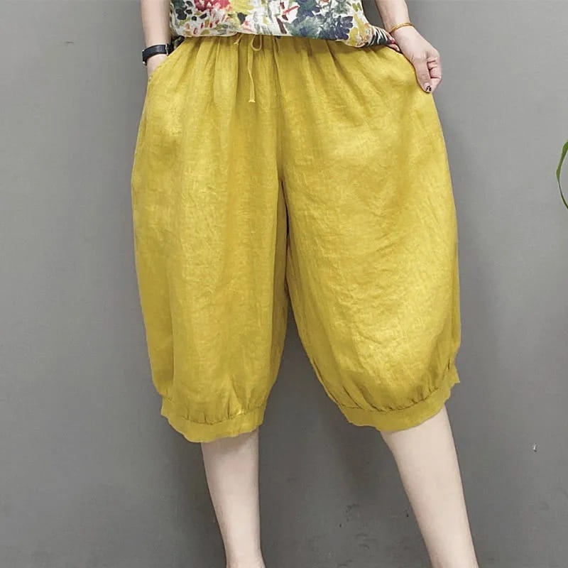 pantalones capri de lino estilo harén de talla grande color amarillo con pretina ajustable con cordón y puños elásticos.