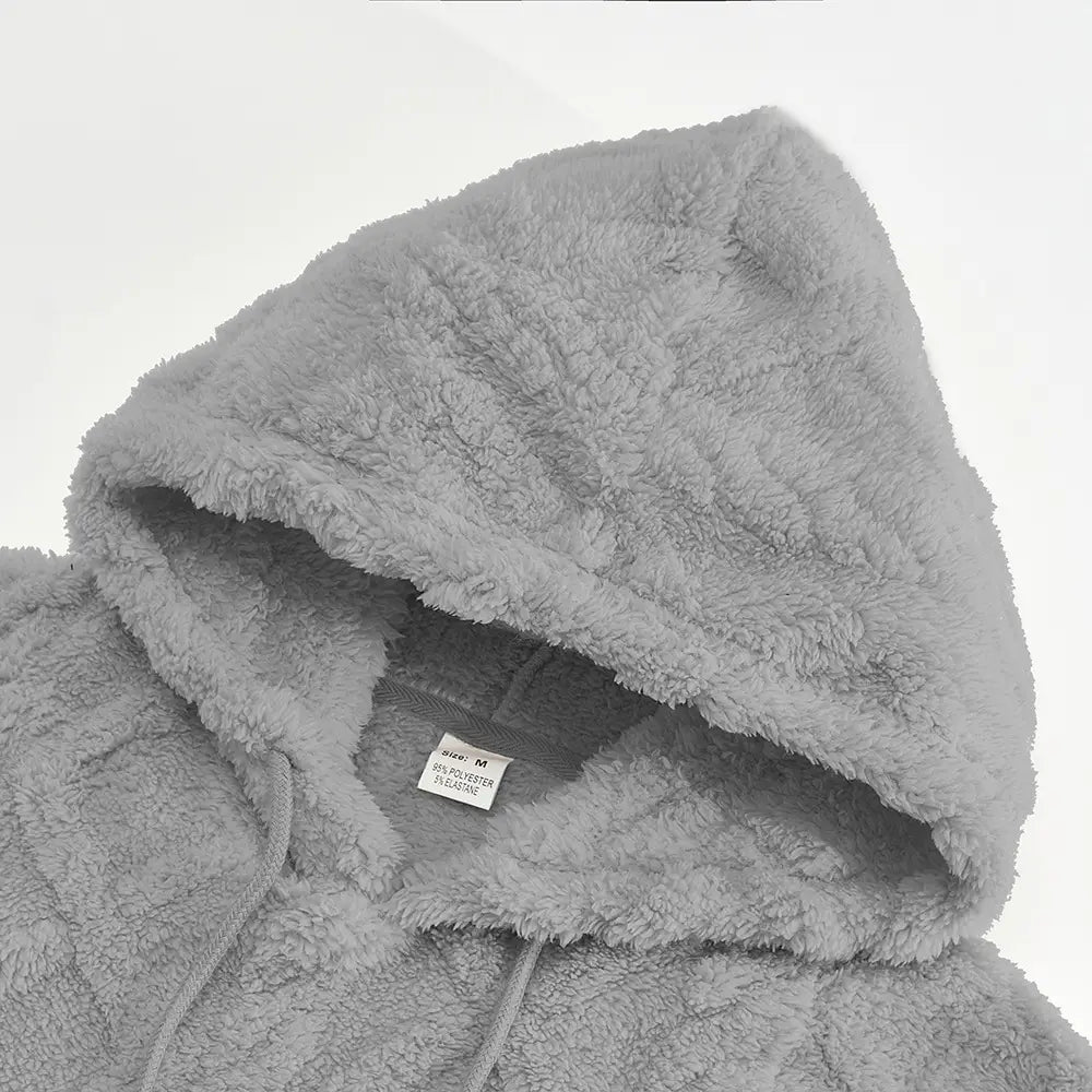 Gray men’s textured fleece lined knit hoodie featuring a soft plush fleece surface and matching drawstrings.