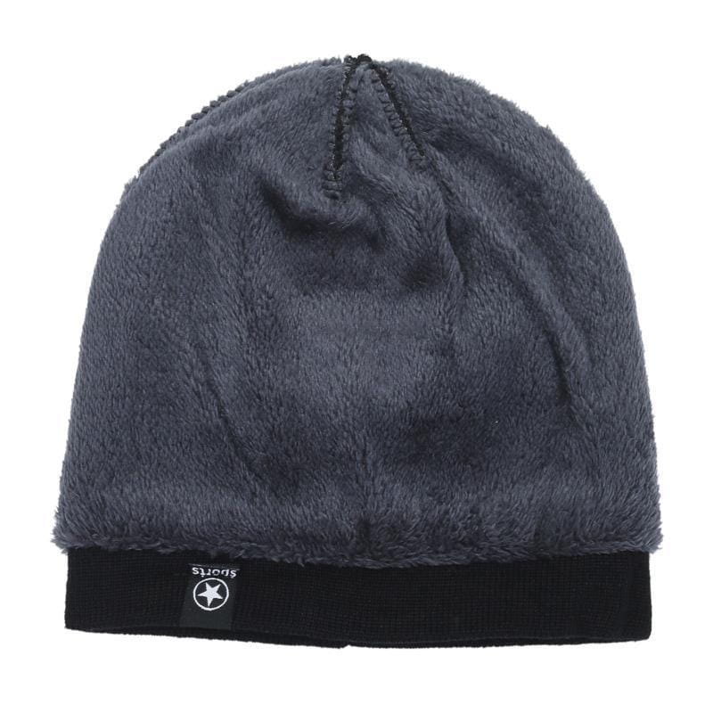 Men’s dark gray fleece lined thermal knitted beanie hat with a black ribbed brim and a small star logo tag.