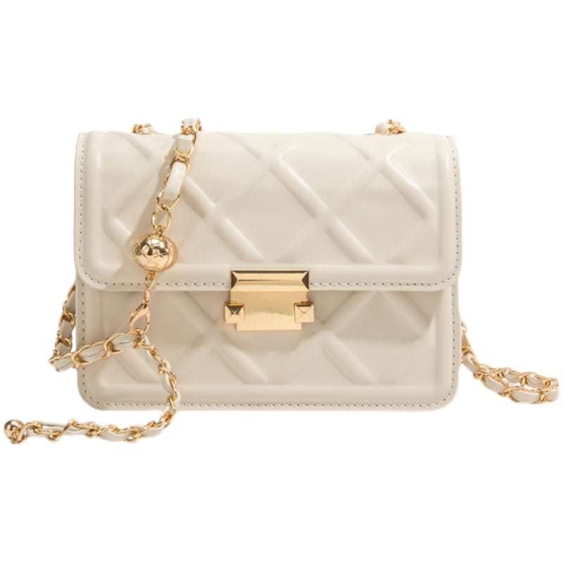 Cream-colored quilted crossbody bag with gold-tone chain strap and clasp made of soft leather.