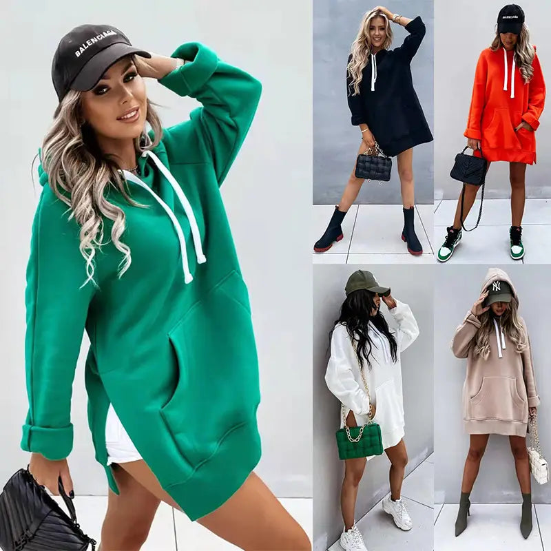 Green oversized mid length hooded sweatshirt dress with white drawstrings pockets and rolled up sleeves made from soft fabric.