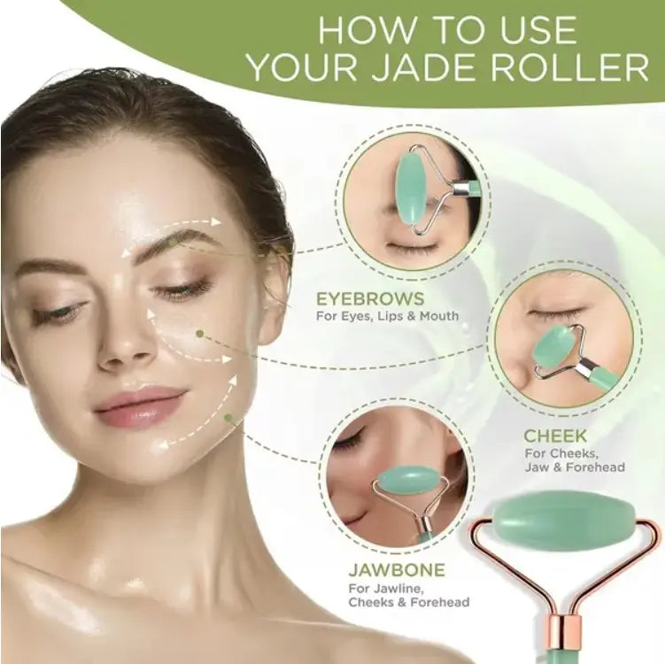 A natural resin jade roller with a smooth light green stone head and metallic handle for facial massage.