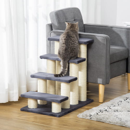 Gray tabby cat perched on a pawhut 4-step cat stairs and sisal scratching post with dark gray platforms and beige sisal-wrapped posts.