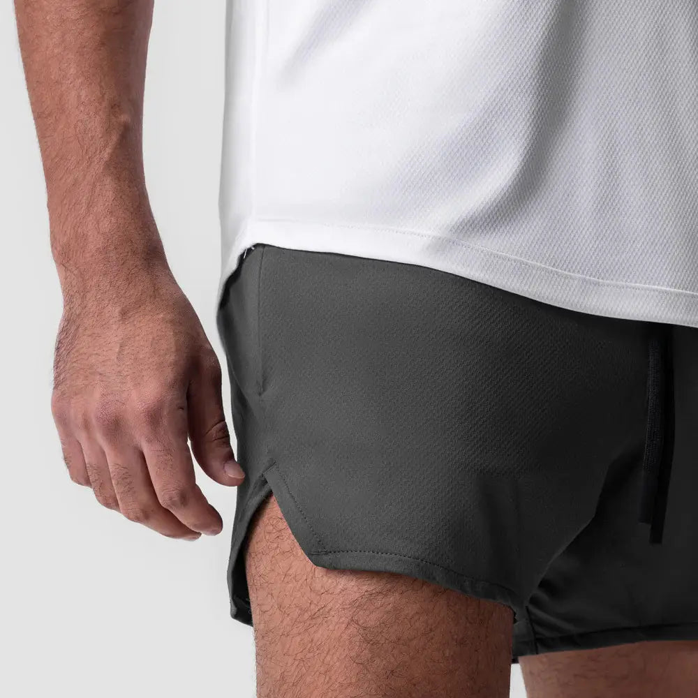 Men quick dry athletic sports shorts in dark gray featuring a subtle textured weave and side seam detailing.