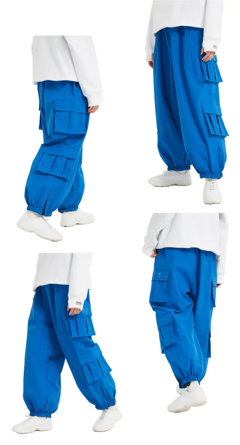 bright blue winter outdoor loose ski pants with multiple cargo pockets and elastic cuffs designed for cold weather activities.