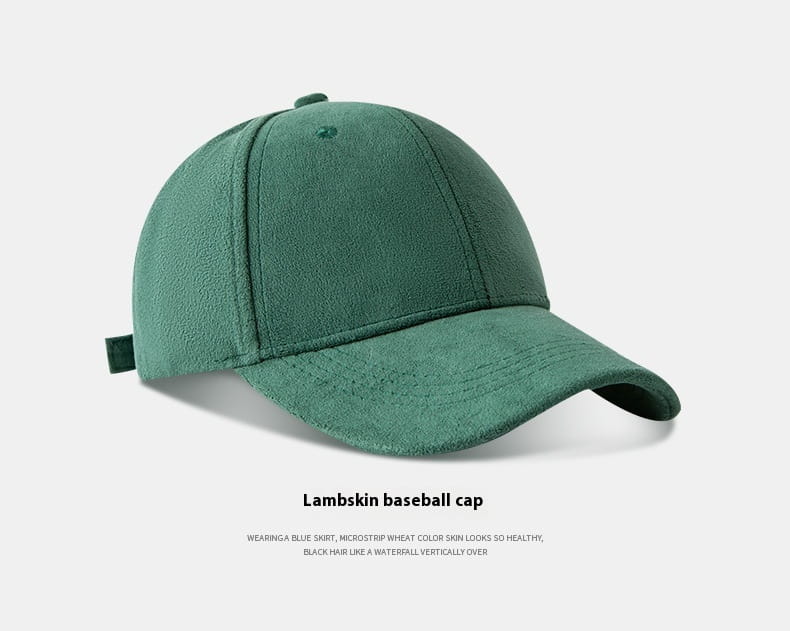 A soft moss-green lambskin baseball cap with a curved brim and adjustable strap from the suede baseball cap soft minimalist adjustable hat collection.