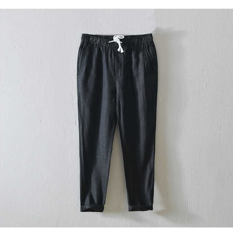 Herren-Casual-Hosen in Übergröße mit geradem Schnitt aus schwarzem Leinen mit weißem Kordelzugbund und umgeschlagenen Bündchen.