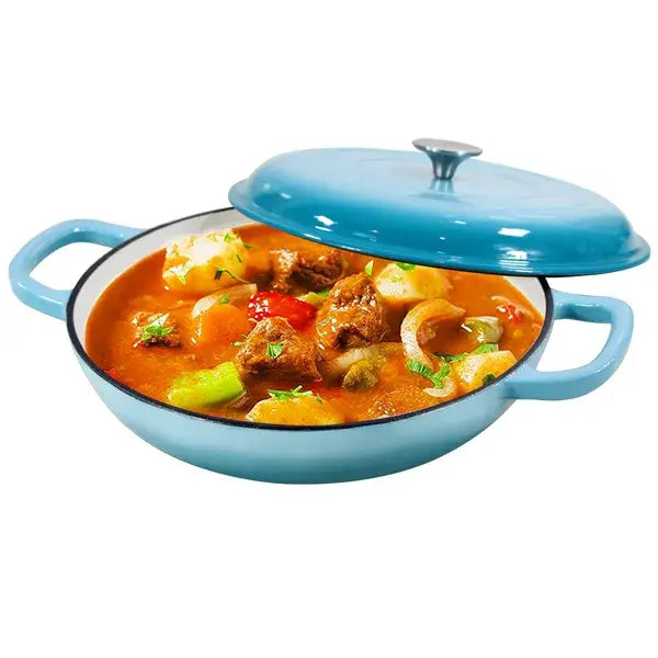 Light blue enameled cast iron braiser 3.8 qt casserole pot with matching lid and side handles filled with hearty stew.