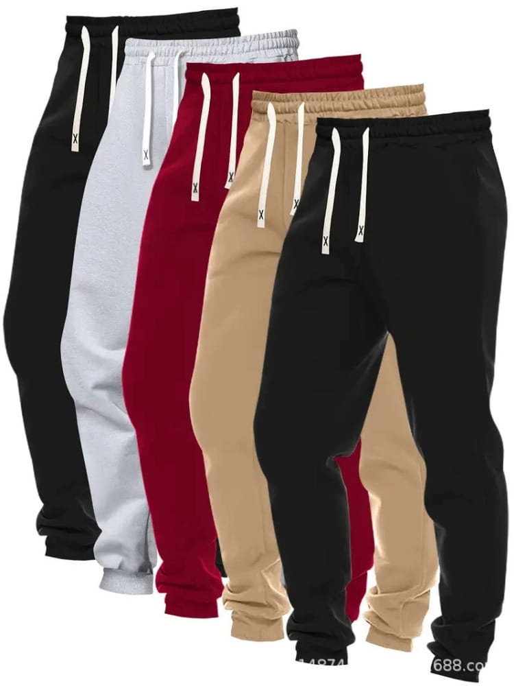 Men’s 5-pack solid jogger pants in black, white, red, beige, and black featuring a drawstring waistband with an x logo on the cord.