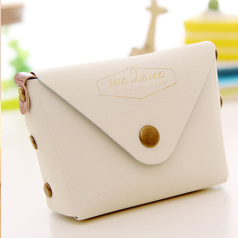 White leather envelope style coin purse with gold tone metal accents and an embossed logo from the Macaron Pastel leather and PVC coin purse set.