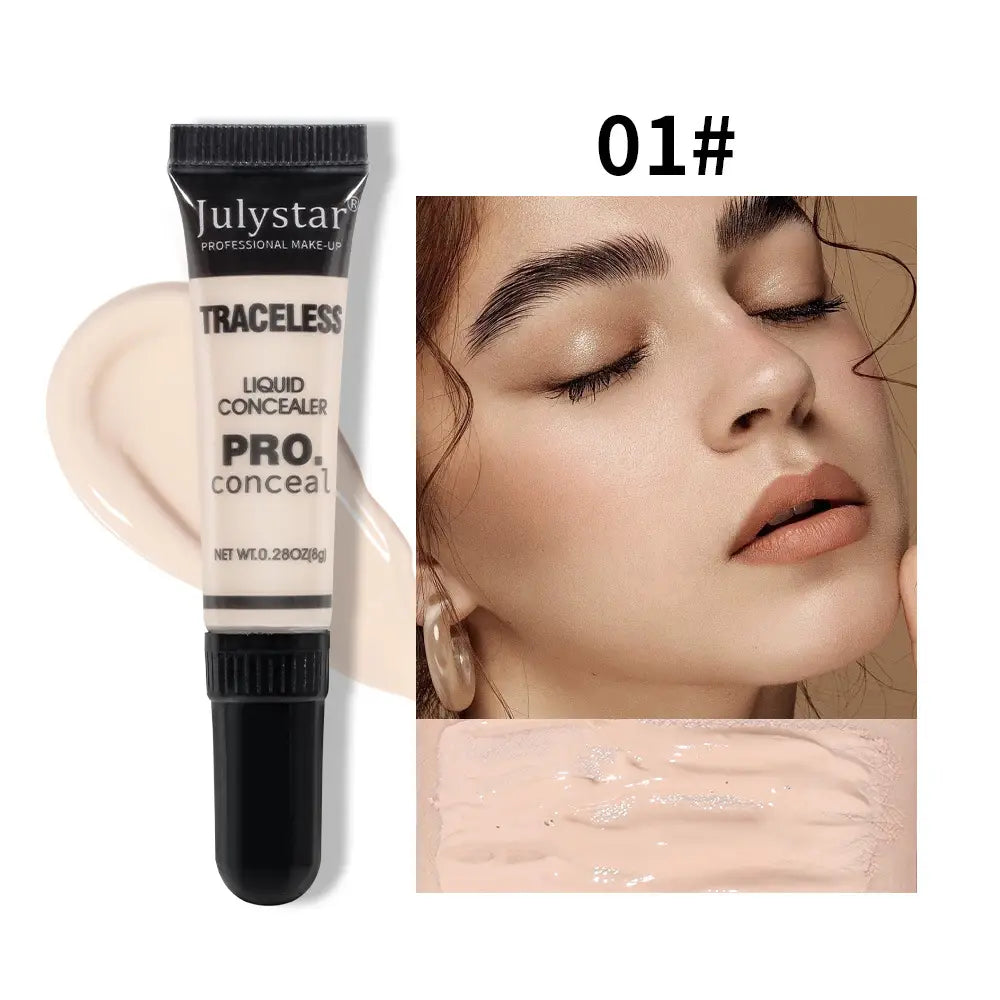 Julystar traceless pro tattoo concealer in shade 01 is a sleek black and white tube containing creamy light beige liquid makeup for seamless coverage.