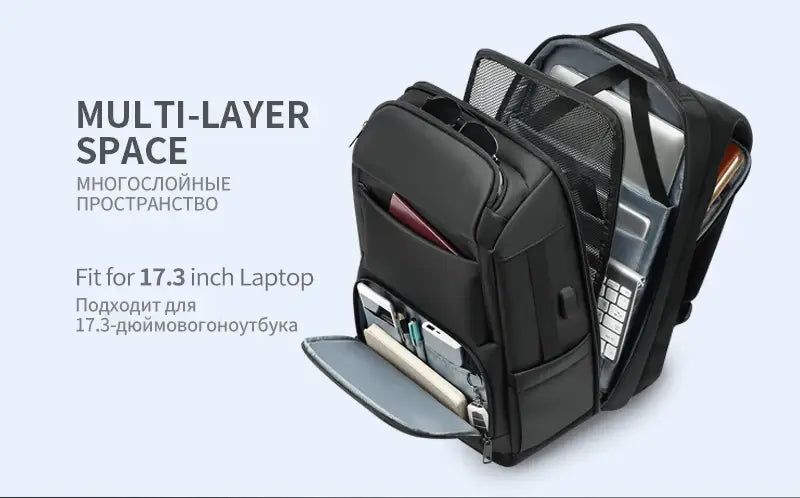 Multifunctional black nylon laptop backpack with multi-layer mesh and zippered compartments designed to fit a 17.3-inch device for business and travel.