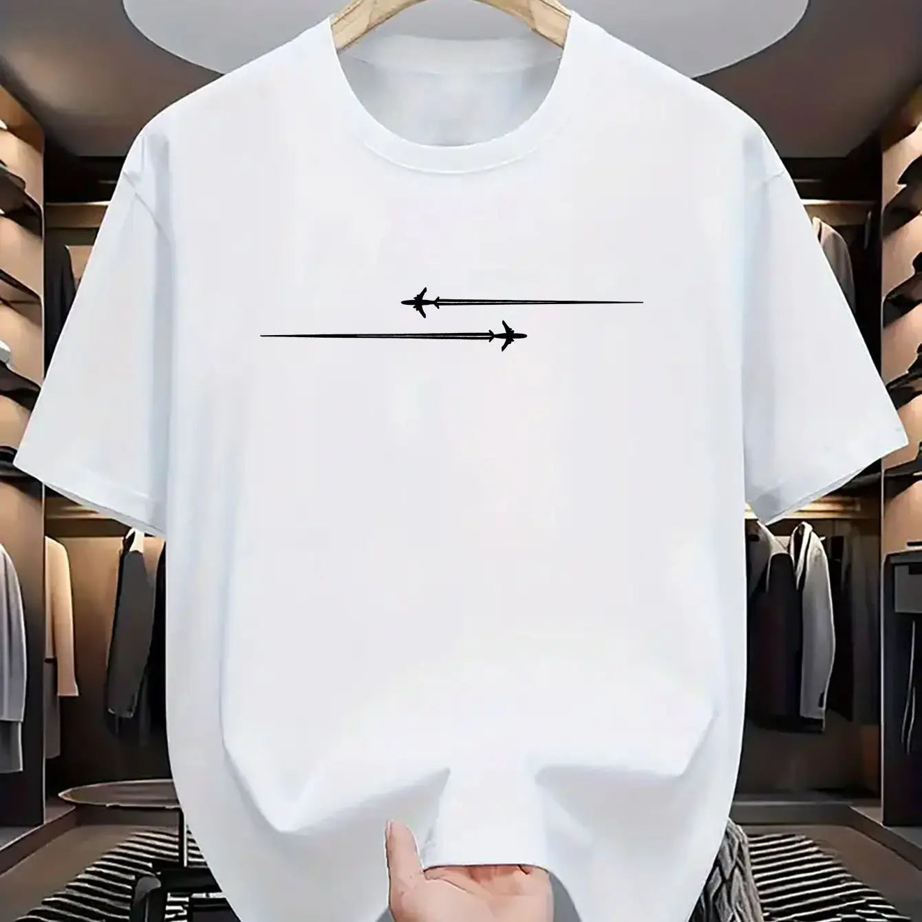 White cotton blend sport t shirt featuring a minimalist black graphic of two airplanes flying in opposite directions on the chest.