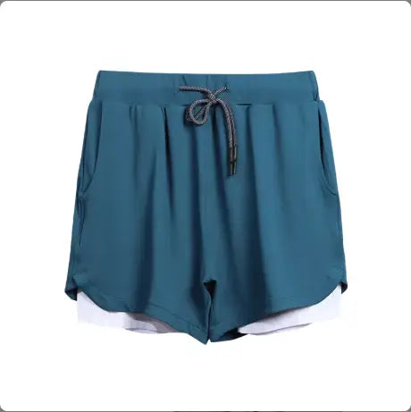 men’s teal double-layered athletic training shorts with a drawstring waistband and white inner lining designed for breathable quick dry performance.