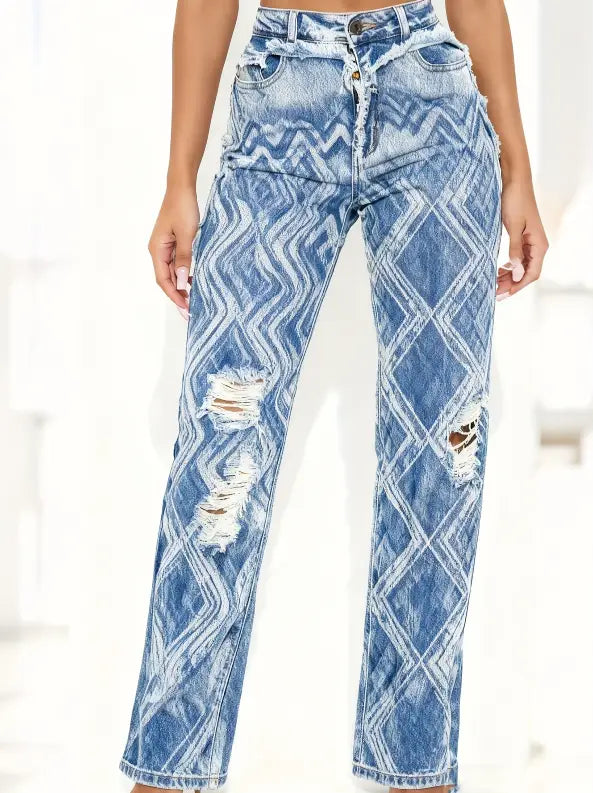 Blue denim straight leg jeans medium wash with a bold white geometric zigzag pattern and intentional distressed rips high waisted.