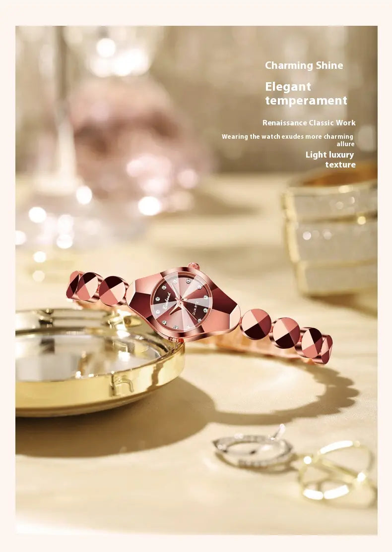 Rose gold-tone luxe geometric faceted bracelet watch with diamond accents and a sleek minimalist dial.