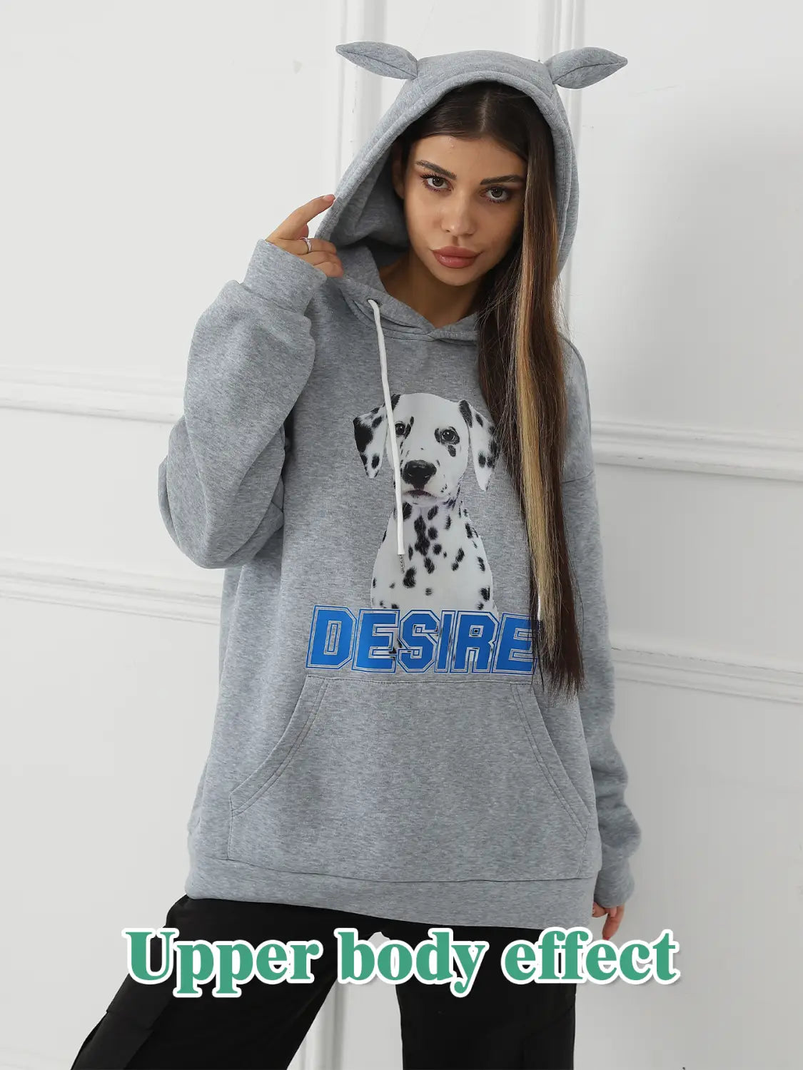 Gray women’s hoodie featuring a dalmatian graphic with desire text and a cat ear trim on the hood.