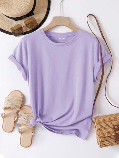 A soft lavender velvet short sleeve casual tee with a simple round neckline and rolled-up sleeves.