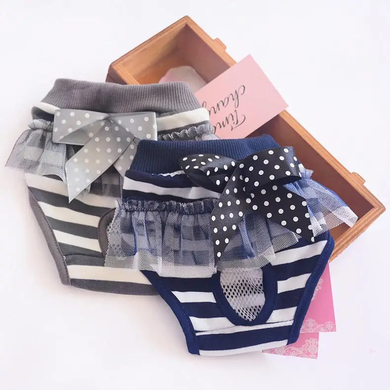 Striped dog physiological pants washable pet diaper with polka dot bow and ruffled mesh trim designed for sanitary use.