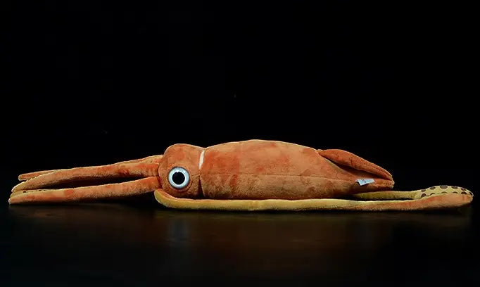 A plush orange squid stuffed animal toy measuring 32 cm featuring a large white eye and yellow tentacles.