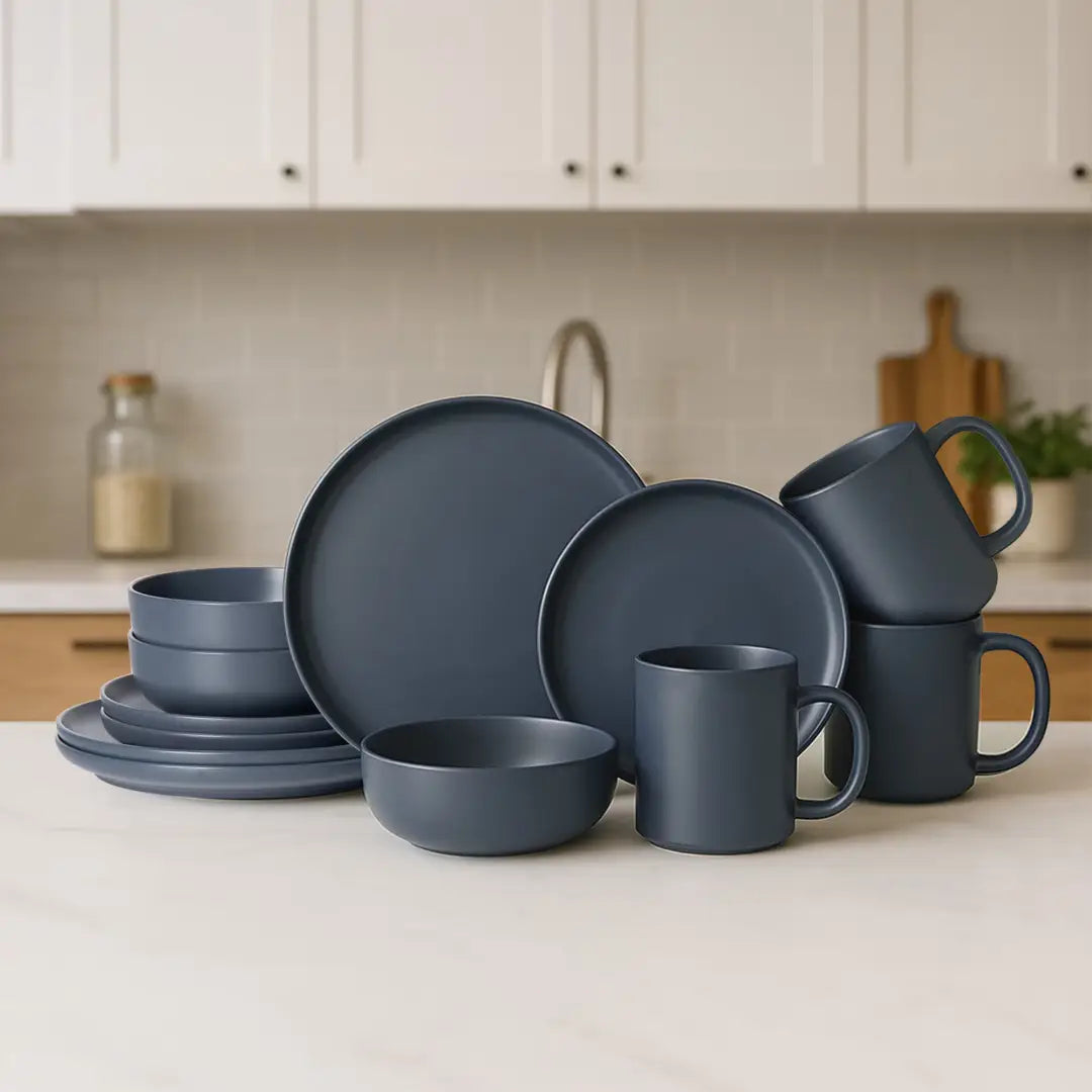 Dark gray ceramic 12-piece stoneware dinnerware set with matte glaze and modern minimalist design for serving three people.