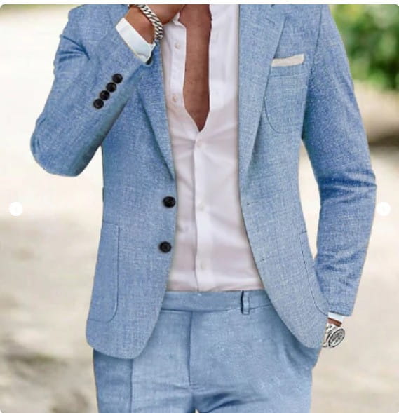 Light blue textured blazer with black buttons and matching trousers in a men casual digital print suit two piece set.