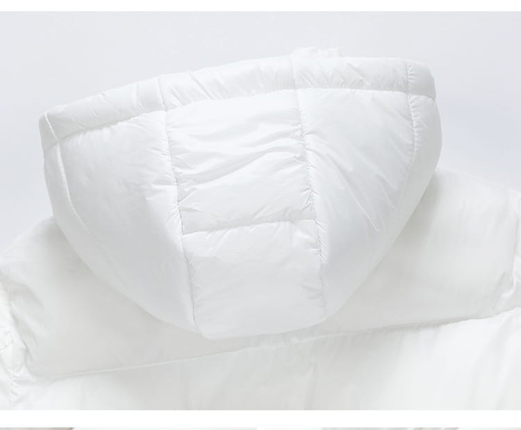 white quilted hood of a men’s hooded corduroy puffer jacket in plus size designed for warmth and comfort.