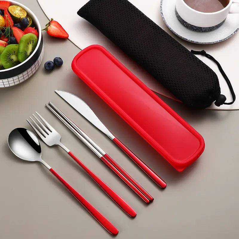 stainless steel portable cutlery set with red-handled utensils and a matching red silicone carrying case.
