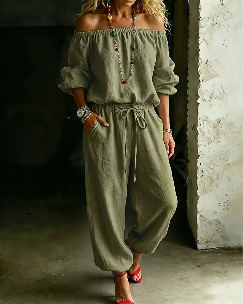 Olive green linen off-shoulder jumpsuit with a drawstring waist from the linen off-shoulder jumpsuit set.