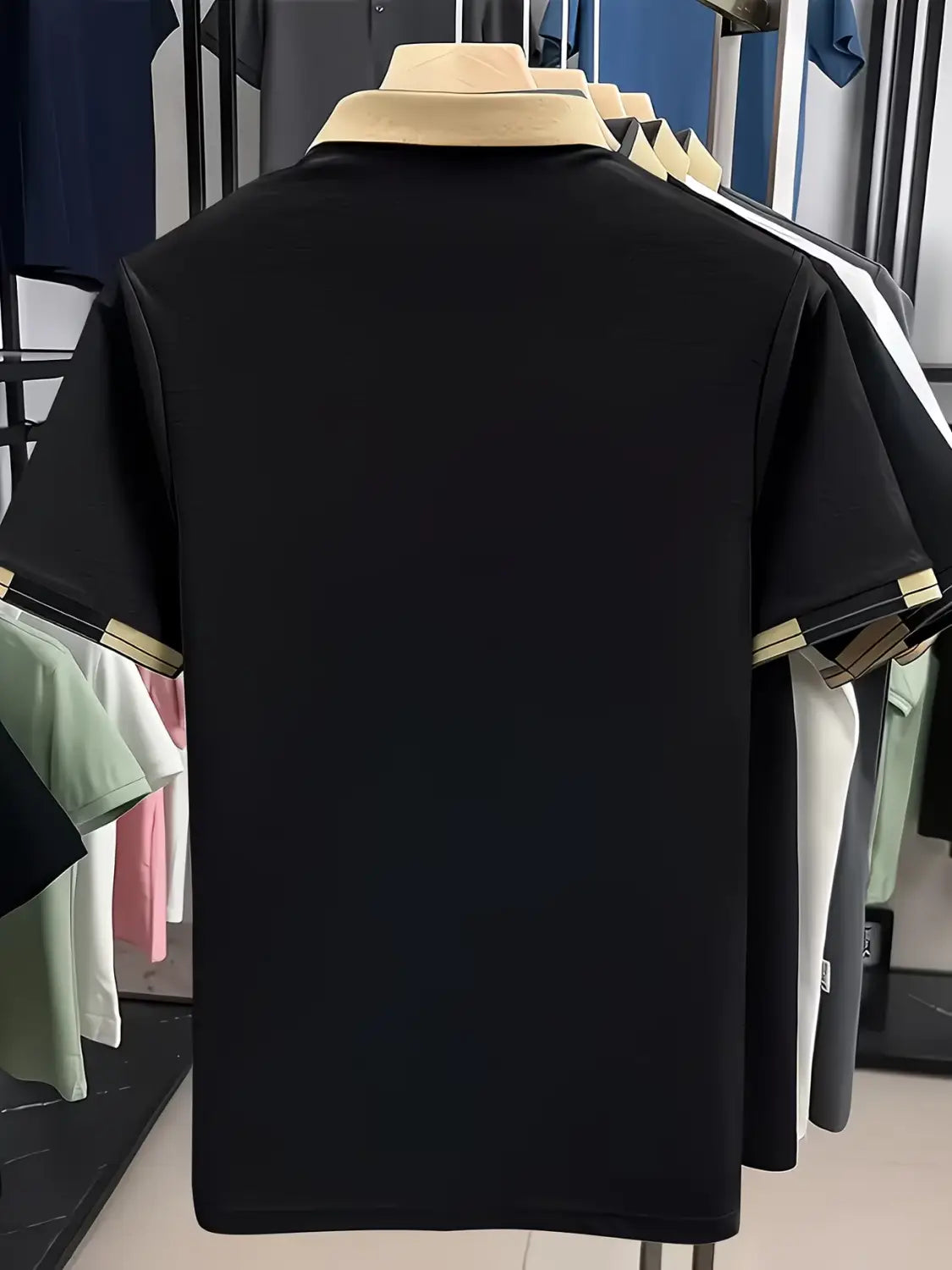Mens slim fit striped polo shirt featuring a black short-sleeved design with a beige collar and gold-trimmed sleeve cuffs.