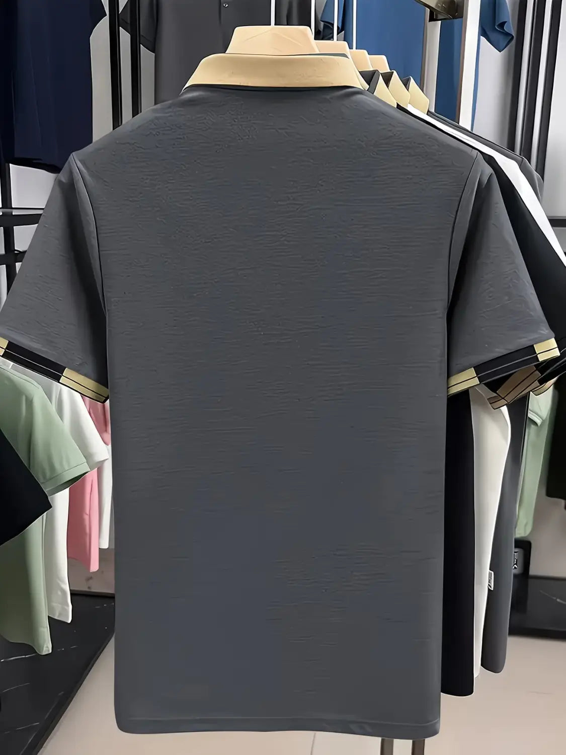 mens slim fit polo shirt in gray with beige collar and black and beige striped cuffs displayed on front side