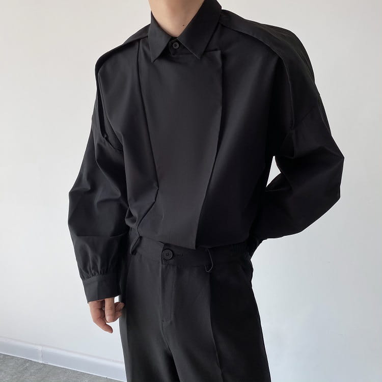 Men oversized long sleeve button up shirt in black featuring a structured collar and asymmetrical front design.