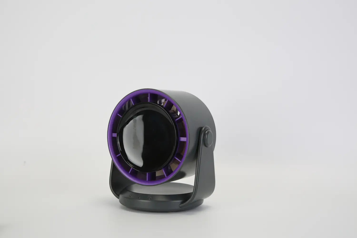 Purple and black rechargeable desk fan with 100 speed settings and 120 degree tilt, featuring a sleek compact and modern design with a 4000mAh battery.