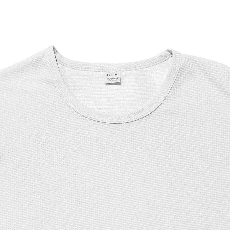 Men’s long sleeve waffle knit thermal pullover in light gray textured cotton-polyester blend with a simple crew neck.