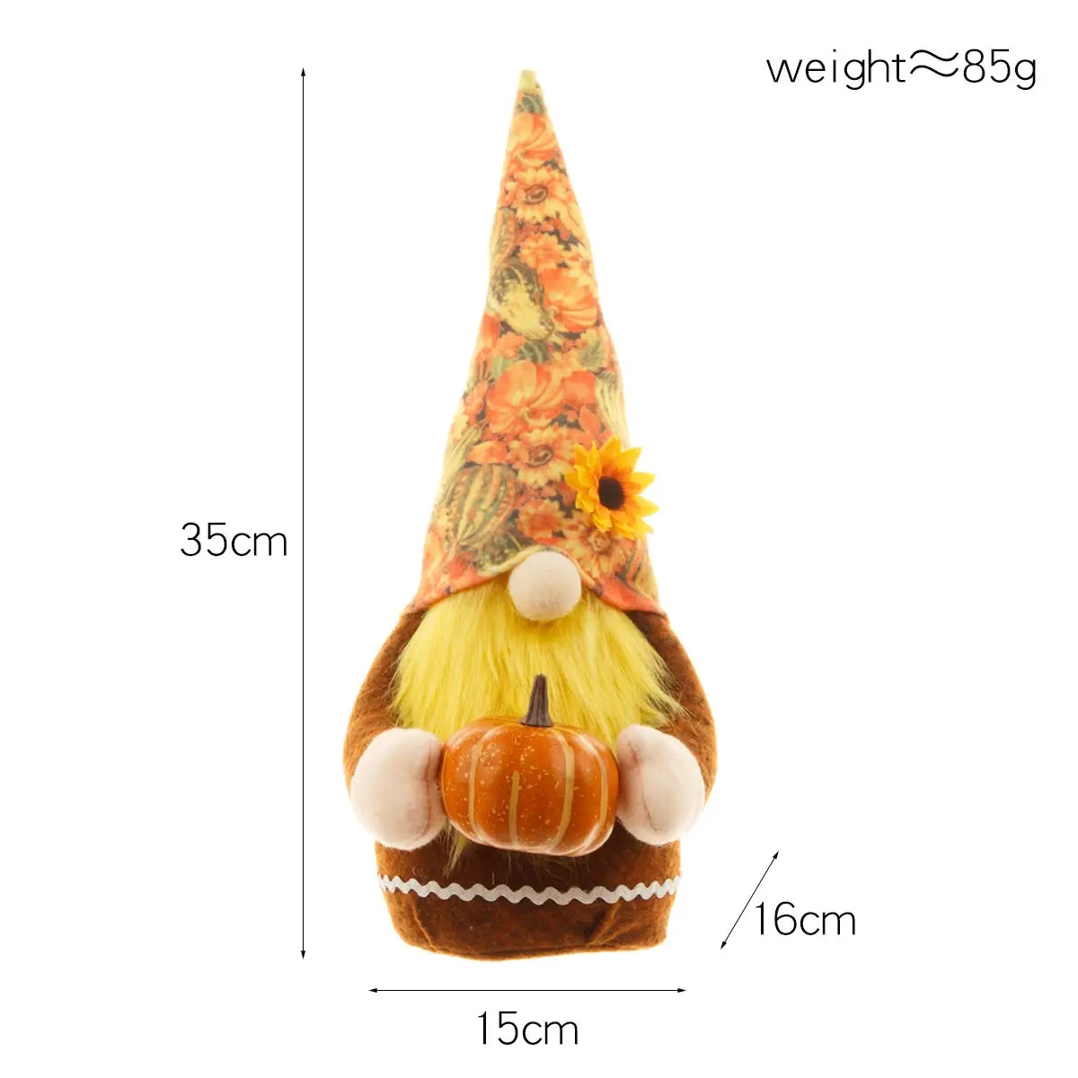 Das Danksagungs-Gnom-Plüschfiguren-Set für den Herbst mit Kürbis umfasst einen weichen braunen Körper mit weißen Fäustlingen, die einen orangefarbenen Kürbis halten, einen gelben Wollbart sowie eine hohe, gemusterte Mütze, die mit Sonnenblumen und Herbstblättern verziert ist.