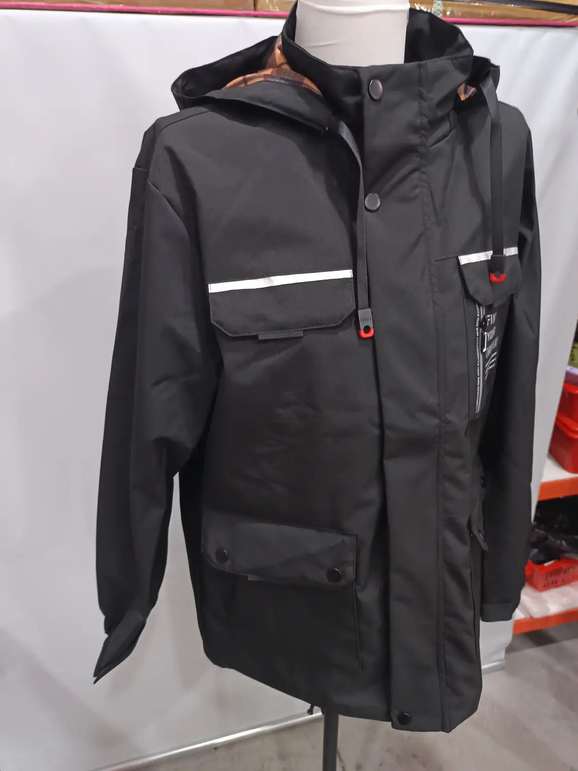 Men winter hooded parka coat in black waterproof material with white reflective stripes and red-accented zipper pulls.