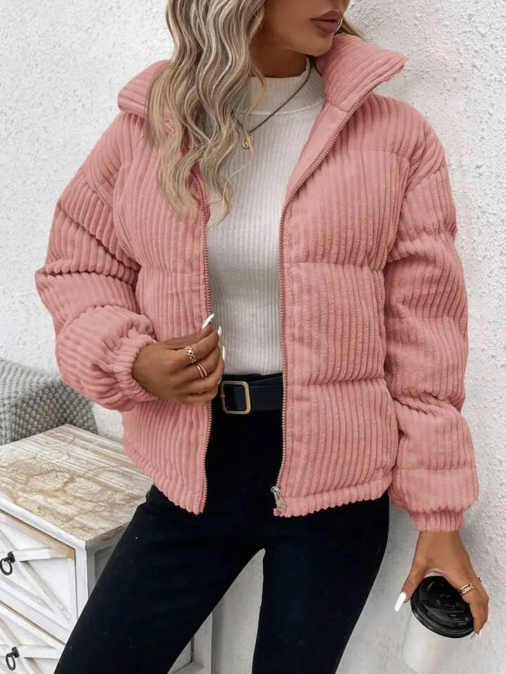 A cozy pink corduroy puffer jacket with a quilted design and ribbed cuffs for plus size women winter coat.