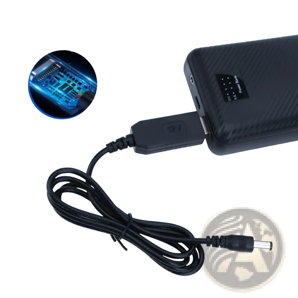 Black usb boost charging cable with 12v adapter plug and connector coiled neatly for portable 5v to 21v power supply