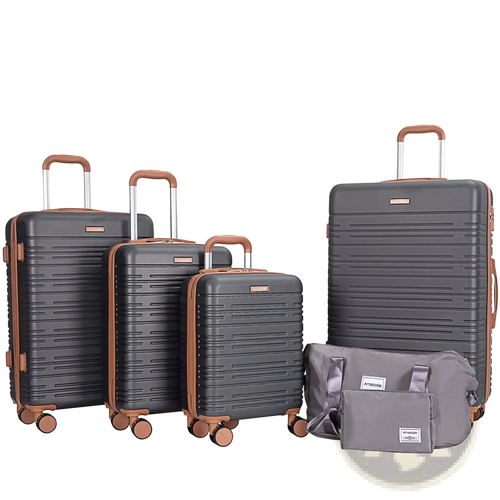 Set of four dark gray abs hard shell spinner suitcases with tan accents and a matching duffel bag with tsa lock