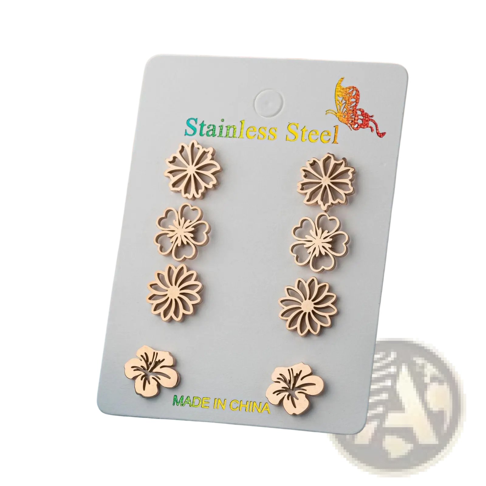 A six-piece floral stainless steel stud earring set in rose gold tone with delicate cutout design on white card