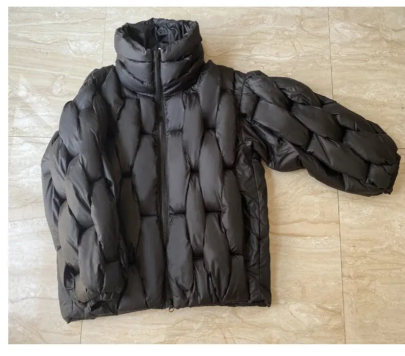 Plus size black quilted puffer jacket featuring a high collar and braided sleeve design.