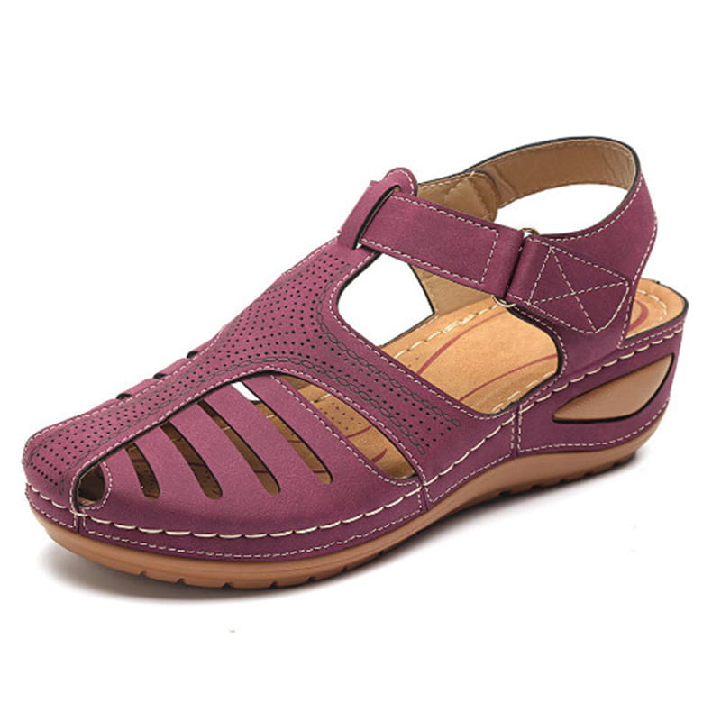Purple suede retro wedge sandals women’s plus size t-strap shoes with perforated and slotted design and tan insole and sole.